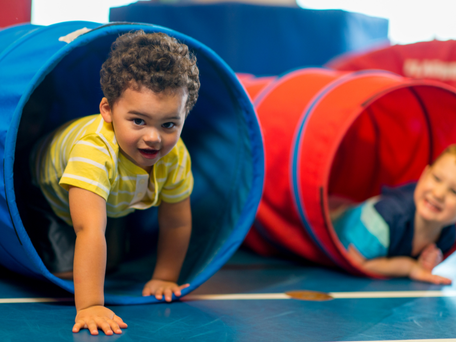 Toddler-climbing-through-tunnel